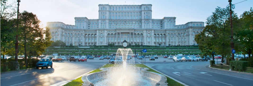 The Parliament Building of Bucharest with a fountain in front